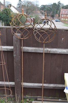 Lot 2 - Pair of metal spiral balls on stems, 160cm high