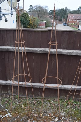 Lot 4 - Pair of traditional open framed metal obelisks,...
