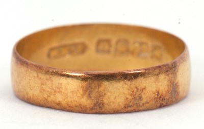 Lot 226 - A 22ct wedding band, 5mm wide, hallmarked...