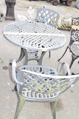 Lot 23 - Cast metal bistro garden set comprising a...