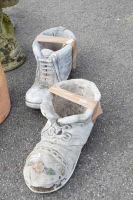 Lot 71 - Two composite garden statues in the shape of...