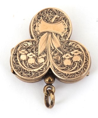 Lot 197 - A shamrock keepsake pendant, the gold plated...