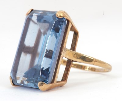 Lot 100 - A 9ct synthetic spinel ring, the emerald cut...
