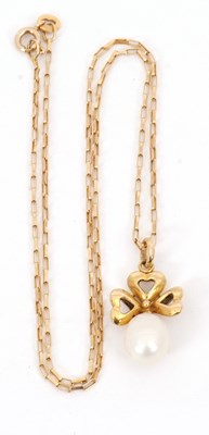 Lot 184 - A cultured pearl necklace, the oval cultured...