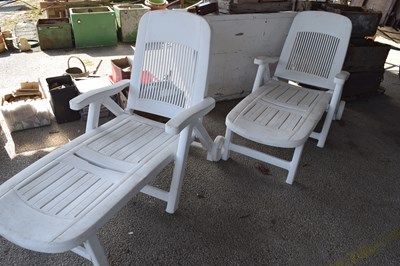 Lot 152 - Pair of plastic sun loungers