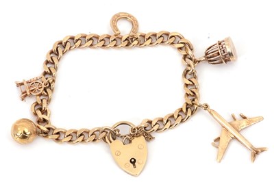 Lot 190 - A 9ct charm bracelet, the curblink bracelet...