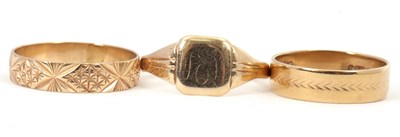 Lot 221 - Three rings: to include a 9ct wedding band...