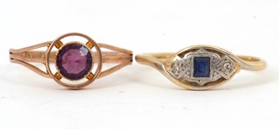 Lot 62 - Two gemset rings: to include a sapphire and...
