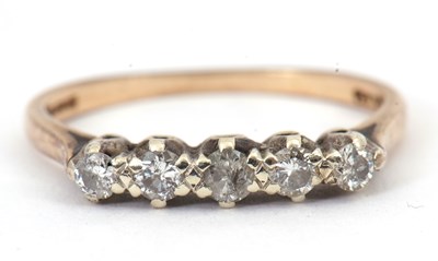 Lot 115 - A five stone diamond ring, set with five round...