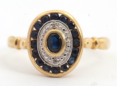 Lot 114 - A sapphire ring, with a central oval sapphire...