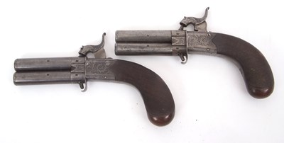 Lot 24 - A pair of over and under percussion travelling...