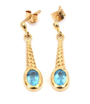 Lot 157 - A pair of 18ct topaz earrings, the oval collet...