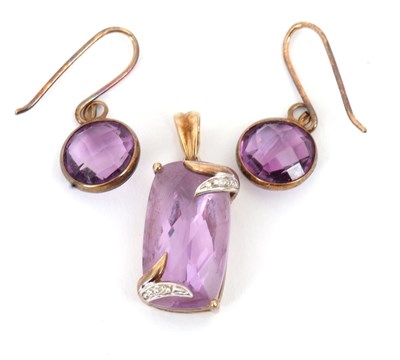 Lot 180 - An amethyst pendant and earrings, the 9ct...