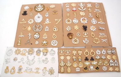 Lot 35 - Four cards of Staybright badges