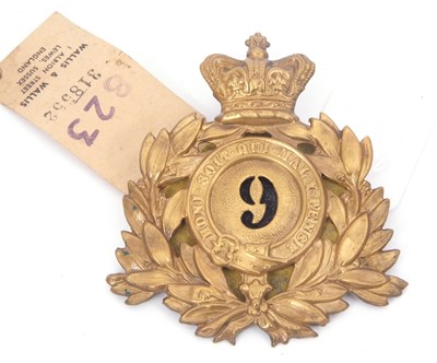 Lot 30B - A Victorian brass helmet plate to the 9th Foot,...