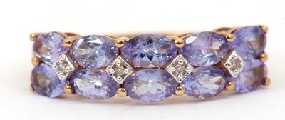 Lot 82 - A 9ct tanzanite and diamond ring, set with two...