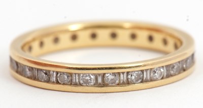 Lot 76 - An 18ct diamond eternity ring, set throughout...