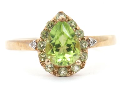 Lot 84 - A 9ct peridot and diamond ring, the pear shape...