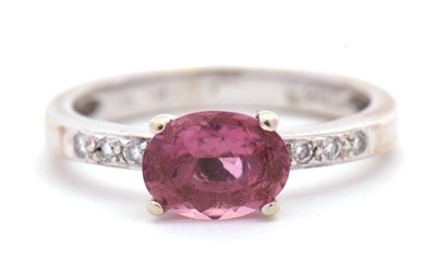 Lot 77 - A 14ct tourmaline and diamond ring, the oval...