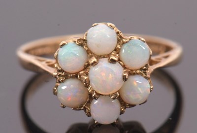 Lot 78 - A 9ct opal cluster ring, set with round opal...