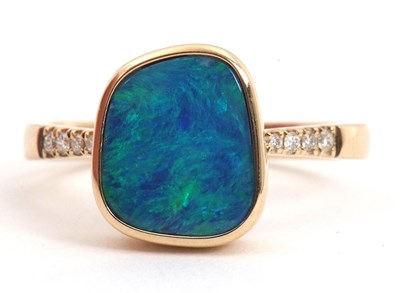 Lot 92 - A 9ct opal and diamond ring, the irregular...
