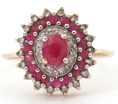 Lot 58 - A 9ct ruby and diamond cluster ring, with...