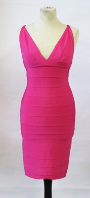 Lot 46 - Herve Leger: a fuschia pink bandage dress,...
