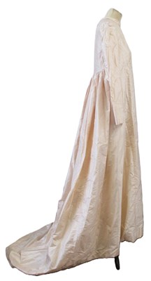 Lot 28 - A mid 20th century wedding dress, with high...