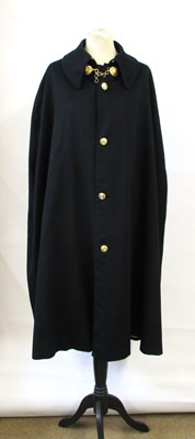 Lot 149 - A gentleman's black wool cape, with cream...