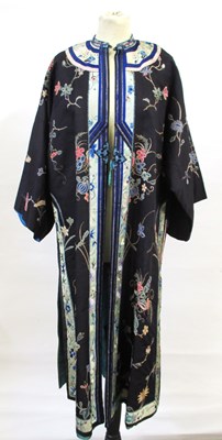Lot 7 - An adapted Chinese silk robe, with embroidered...