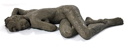 Lot 250 - A sculpture of a girl in recumbent pose by...