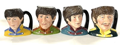 Lot 339 - Royal Doulton: The Beatles; Set of Four Character Jugs