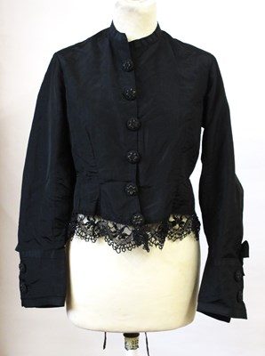 Lot 2 - A Victorian black jacket, with button front...