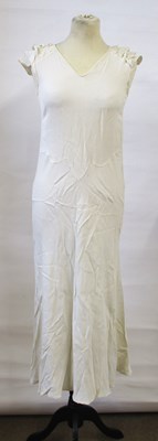 Lot 9 - An early 20th century custom made cream bias...