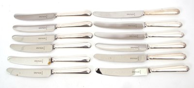 Lot 100 - Six table knives together with six matching...