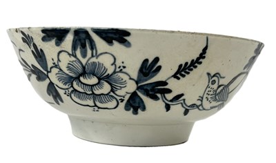 Lot 273 - A Liverpool porcelain bowl with bird in branch...