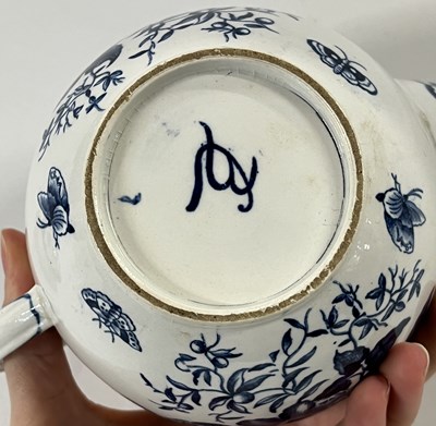 Lot 44 - A Booths Worcester style teapot and cover with...