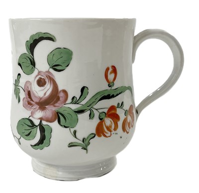 Lot 298 - A large bell shaped tankard with rose and...