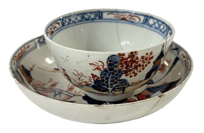 Lot 342 - A Lowestoft tea bowl and saucer in the dolls...