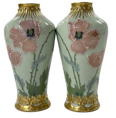 Lot 315 - A pair of continental porcelain vases in Art...