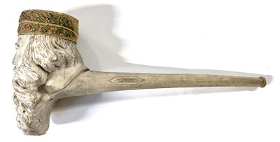 Lot 350 - A clay pipe of Father Christmas, the stem...