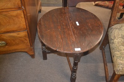 Lot 372 - A small pine top cricket type table in the...