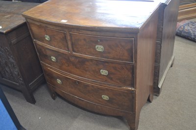 Lot 387 - A small late Georgian mahogany bow front chest...
