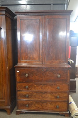 Lot 416 - A Georgian mahogany secretaire cabinet, the...