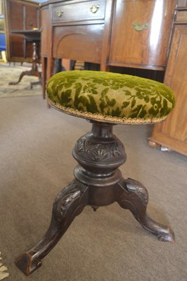 Lot 424 - A late Victorian revolving piano stool with...