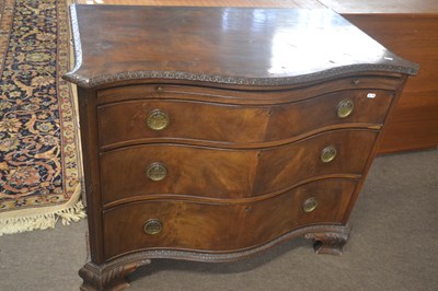 Lot 435 - A Georgian Revival mahogany serpentine front...