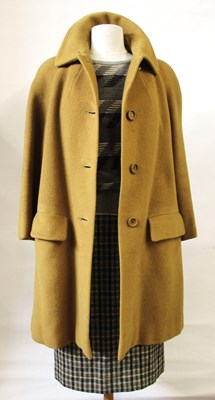 Lot 31 - A Jaeger mustard woold coat size 12; a Jaeger...