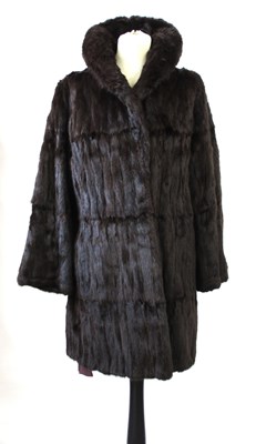 Lot 70 - A lady's fur coat and matching hat, (2)