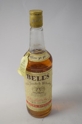 Lot 50 - Two various bottles of Bells Whisky comprising...