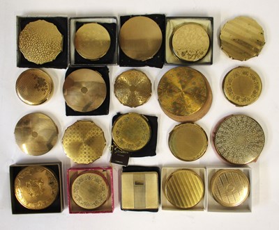 Lot 105 - Twenty gold toned compacts and a Millers...